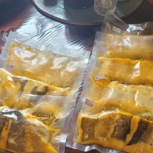 Merluza en aceite de achiote